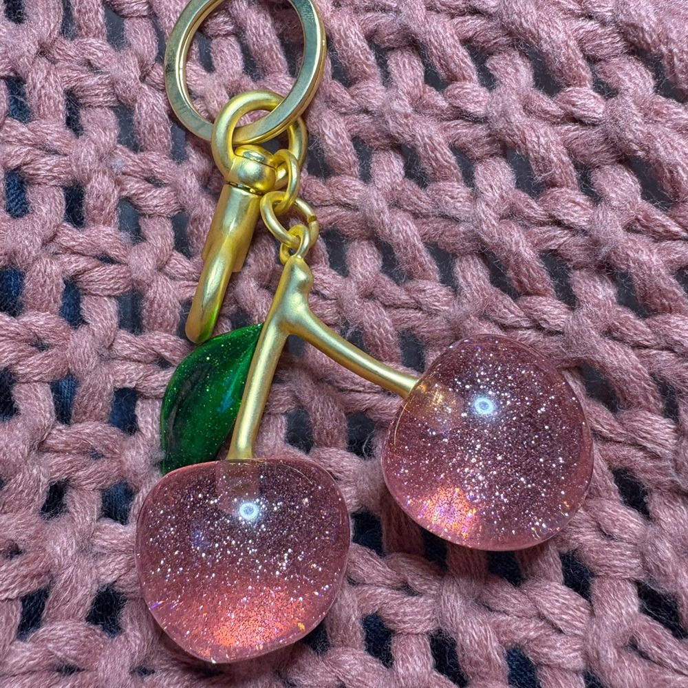 COACH Gold and Pink Cherry Pendant Necklace